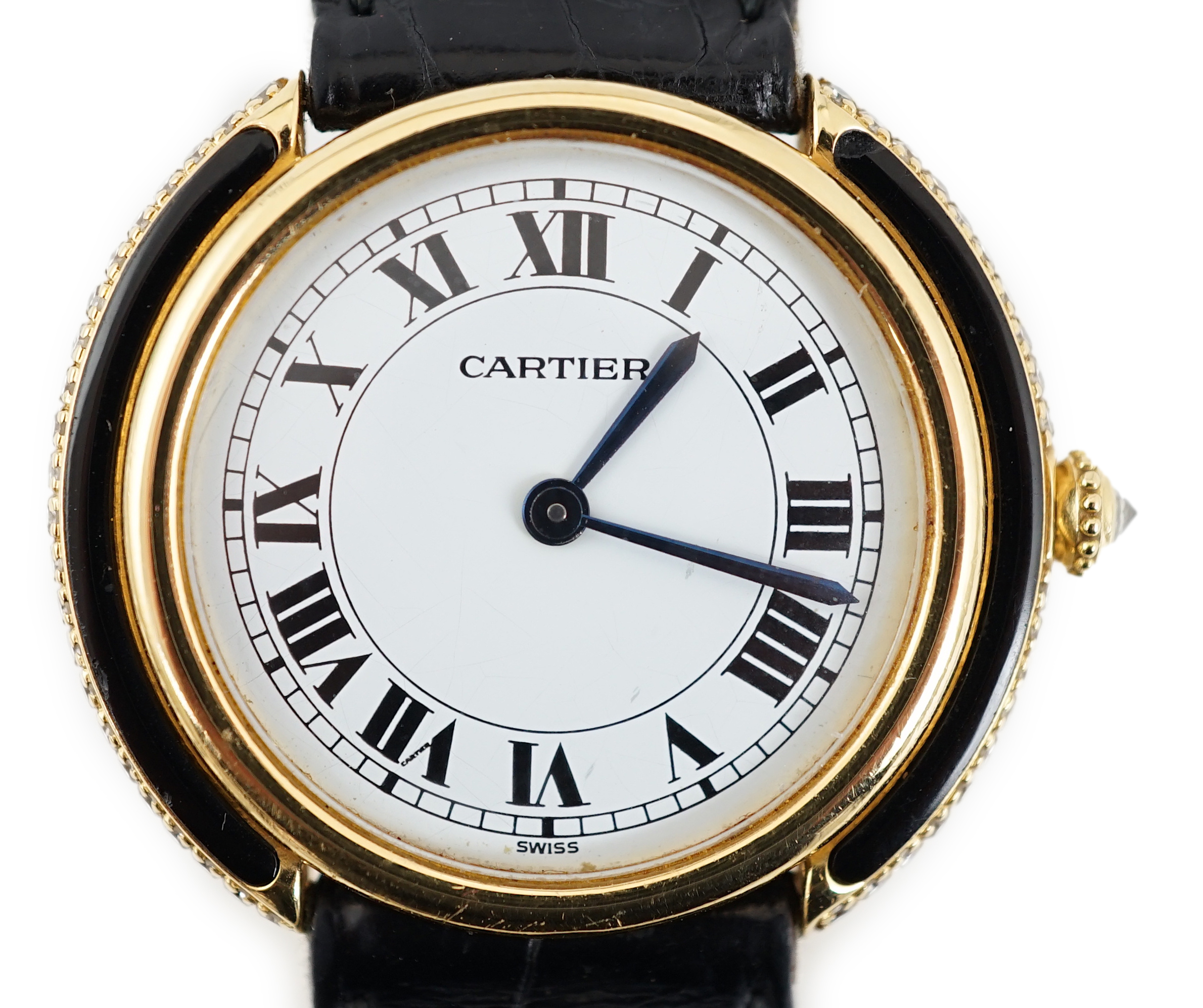 A lady's 18ct gold, black onyx and diamond set Cartier Vendome manual wind wrist watch